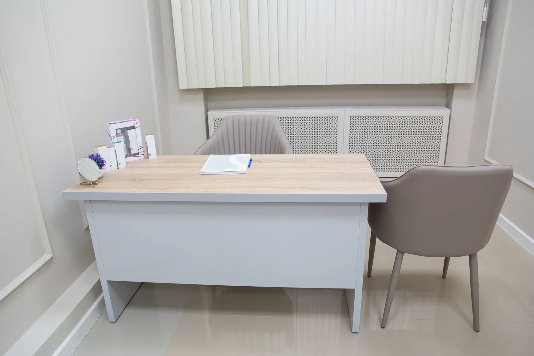 The consulting room: the doctor's desk with a chair for the patient